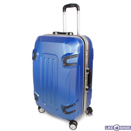 Пластиковий чемодан ручної поклажі в літак.